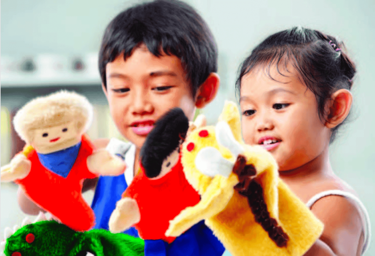 Kids playing with puppets